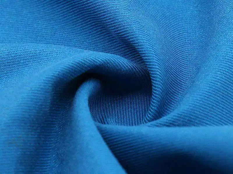 Vải pique CVC 65/35 Kết cấu bề mặt của vải thun pique CVC pha cotton và polyester