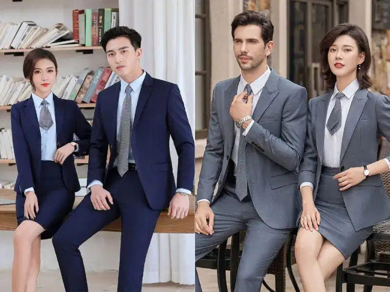 Nhân viên công sở giao tiếp với đối tác trong trang phục vest đồng phục thanh lịch