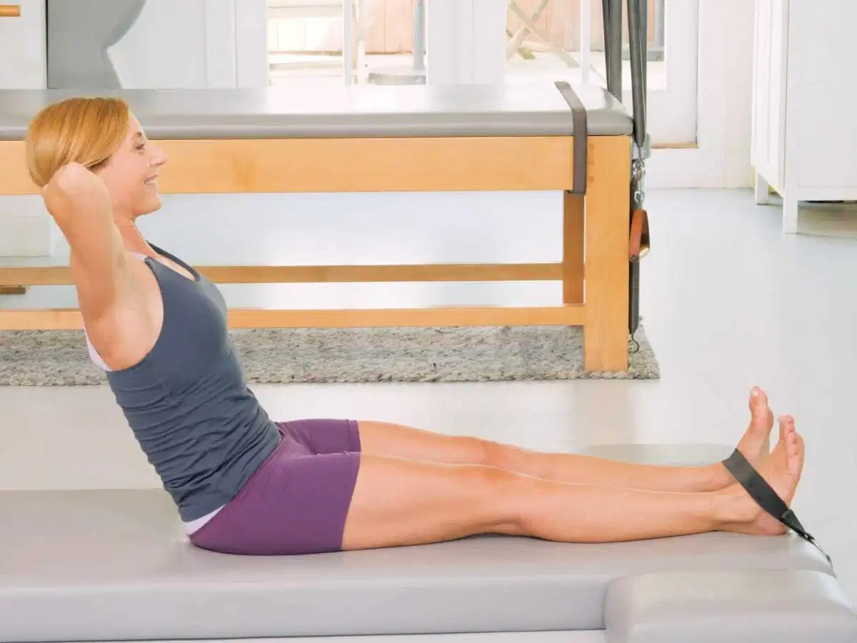 Neck Pull tăng sức mạnh cơ lưng và giải phóng vùng cổ Động tác Neck Pull trong Pilates
