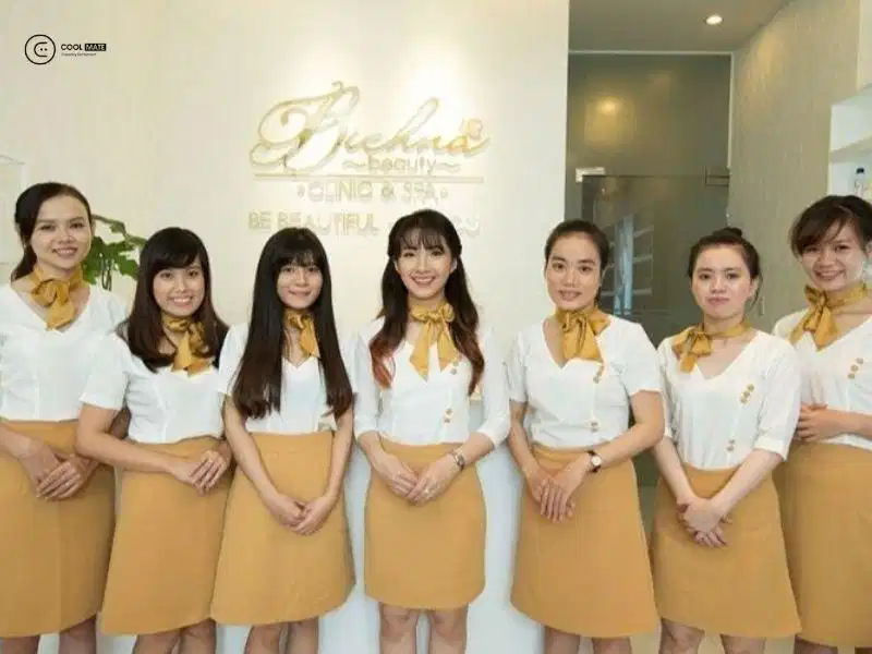 Đồng phục BichNa Beauty Áo sơ mi màu vàng kết hợp chân váy chữ A của BichNa Beauty